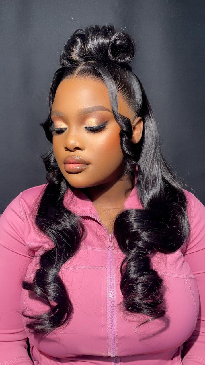 Client with knotless braids styled at Magnolia Hair & Beauty in Cape Town